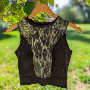 Koral Activewear "Pare" crop top with snake print design. 🐍